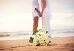 Just married couple holding hands on the beach, Hawaii Beach Wedding